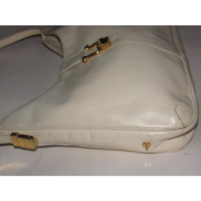Early, Gucci, Jackie supple off-white colored leather XL hobo style shoulder bag with a gold horse-bit closure and accents, and two settings for the strap's length | AlmaBagz - Image 6