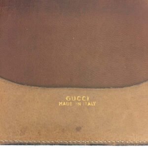 Early Gucci brown canvas with an orange diagonal GG logo print and camel leather bi-fold wallet | AlmaBagz