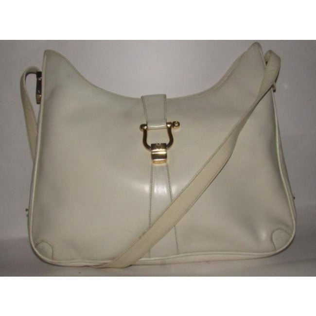 Early, Gucci, Jackie supple off-white colored leather XL hobo style shoulder bag with a gold horse-bit closure and accents, and two settings for the strap's length | AlmaBagz - Image 7