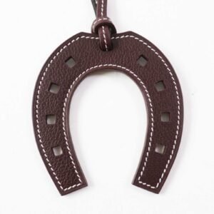 HERMES Bag charm leather Dark brown Paddock schbar | AlmaBagz