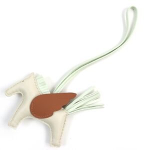 HERMES Bag charm Anyo Miro Clay/Veil Fizz/Gold Rodeo Charm Pegasus PM | AlmaBagz