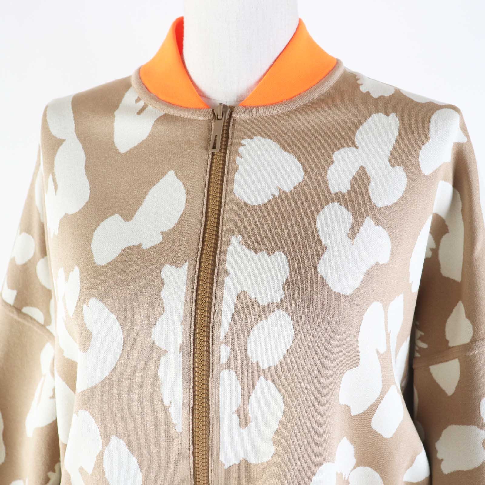 HERMES 2H2816DR Main: 100% silk, knit: 51% silk, 37% polyester, 7% nylon, 5% polyurethane, rib: 69% polyester, 18% nylon, 13% polyurethane, string: 58% silk, 42% polyester Beige Neon Orange JUNGLE LOVE Women 34 Used | AlmaBagz