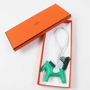 HERMES Bag charm Anyo Milo Horsehair Mint/Malachite/Blue Brume Rodeo Charm PM | AlmaBagz