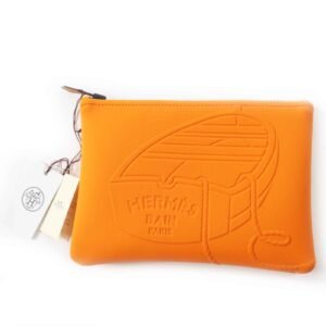 HERMES Pouch Main: Polyamide, Main: Elastane, Lining: Cotton, Part: Leather Orange Neoban Thalassa PM Women Used | AlmaBagz