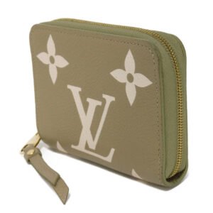 LOUIS VUITTON Coin case M82448 Implant leather (monogram embossed) khaki x claim Monogram Unplant Zip around purse Women Used | AlmaBagz