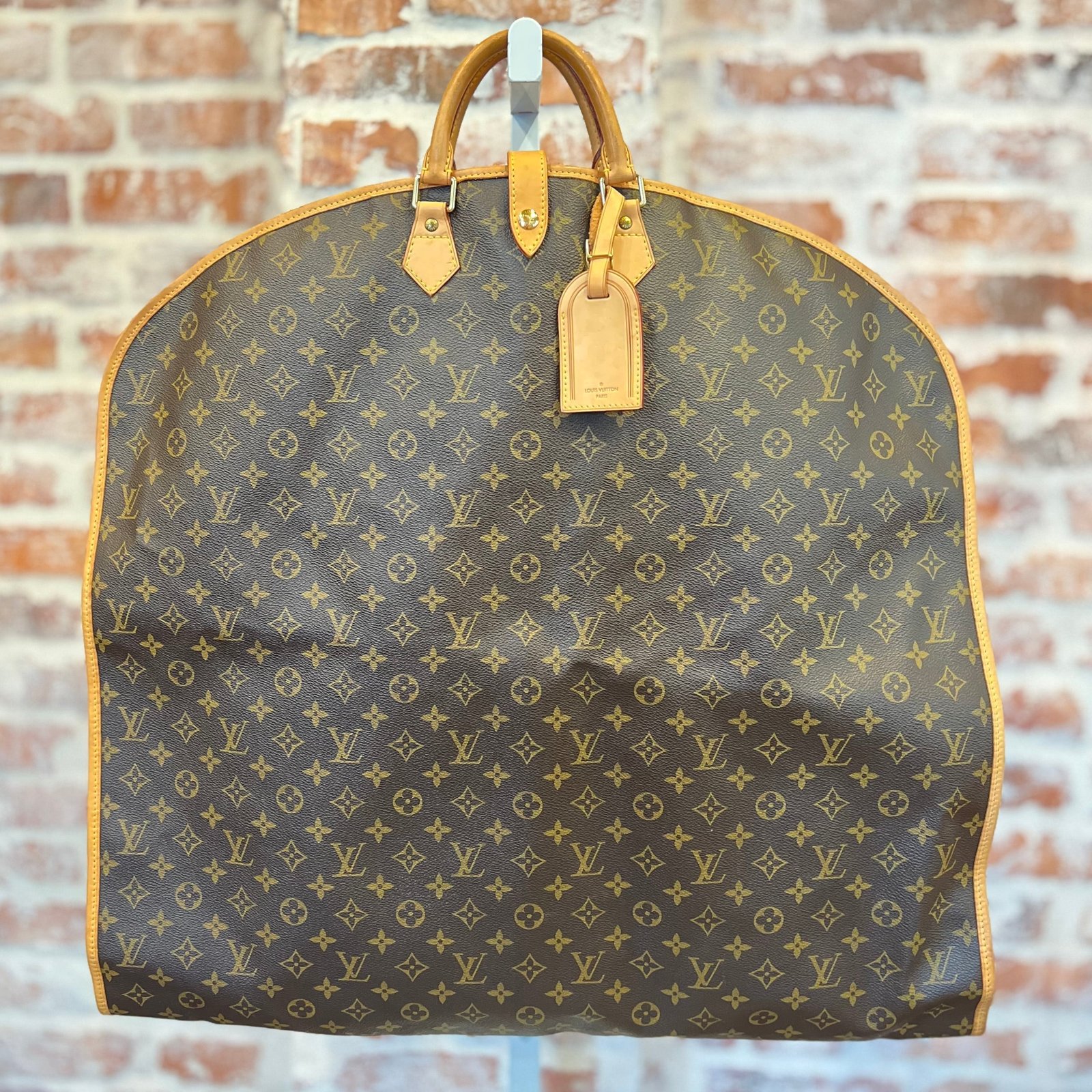 LOUIS VUITTON Brown Monogram Coated Canvas Garment Cover | AlmaBagz