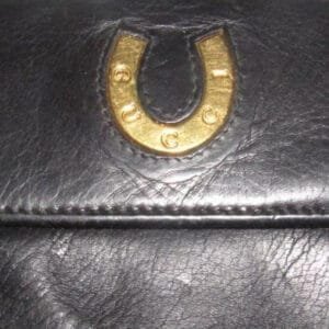 Gucci Supple Black Leather Bi-fold Horseshoe | AlmaBagz