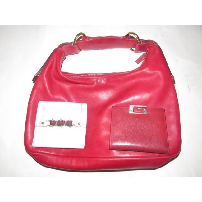 Gucci, true red leather, bi-fold, wallet with a change purse, gold G hinged closure, and lots of interior card slots | AlmaBagz