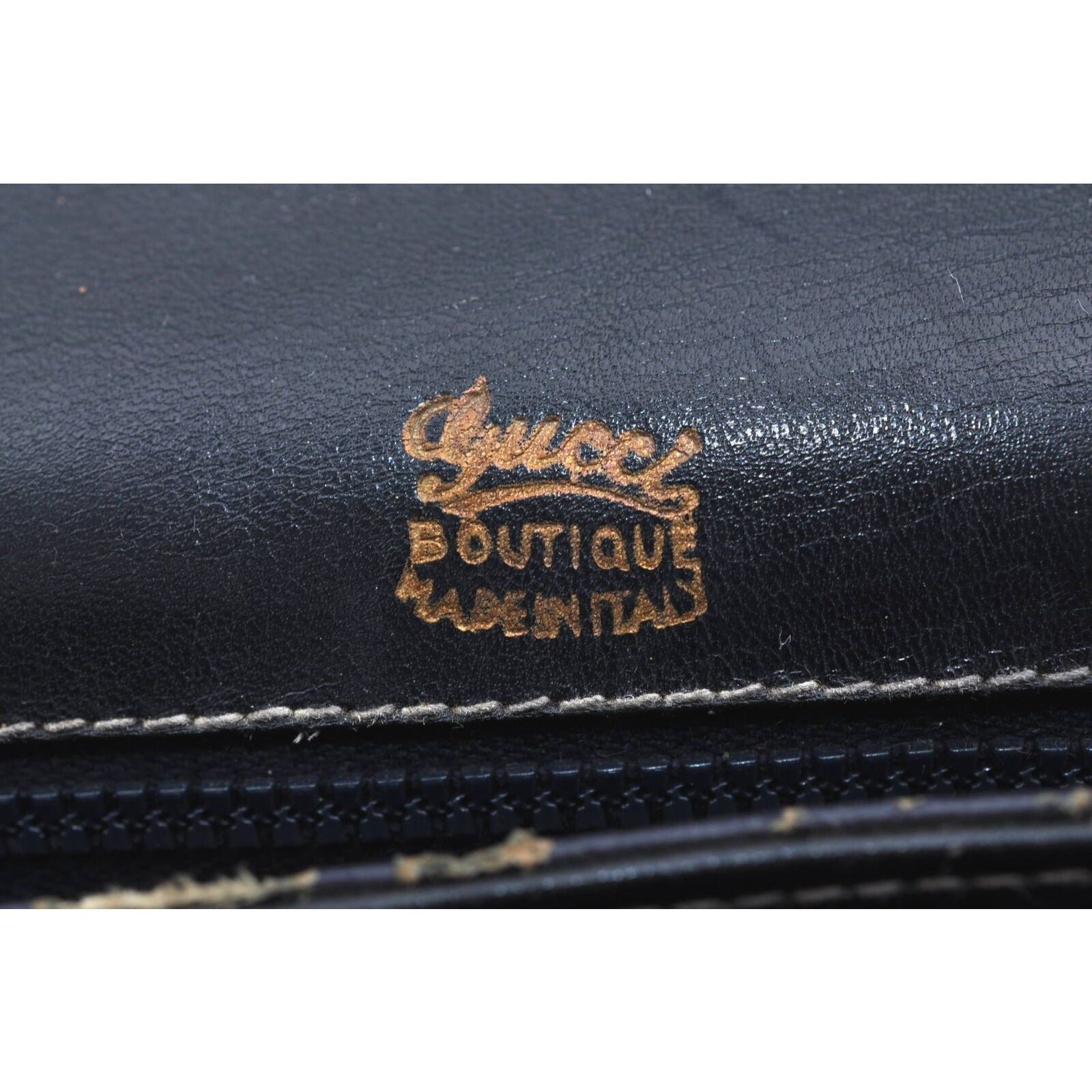 Gucci 60's navy leather saddle bag with gold logo clasp | AlmaBagz