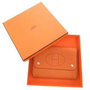 HERMES Other accessories Taurillon Clemence Orange Etui Cult GM Evelyn | AlmaBagz