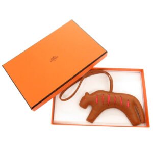 HERMES key ring Anyo Miro gold Lulu charm | AlmaBagz