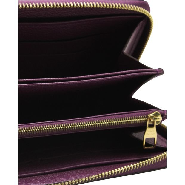 LOUIS VUITTON Purple Monogram Embossed Zippy Wallet | AlmaBagz
