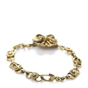 Gucci Metal Floral Bracelet in Aged Gold | AlmaBagz