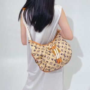 LOUIS VUITTON Limited Edition Tan Nylon Monogram Bulles PM Bag | AlmaBagz