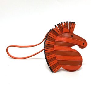 HERMES Bag charm Anyo Miro Orange zebra Gee Gee Savannah | AlmaBagz