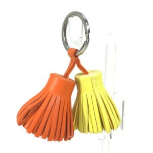 HERMES key ring Anyo Miro Orange x yellow fringe Carmen Unodos | AlmaBagz