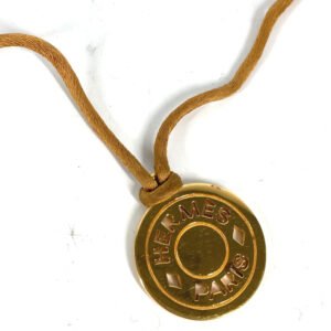 HERMES Necklace Leather, Metal gold Accessories Serie logo round Women Used | AlmaBagz