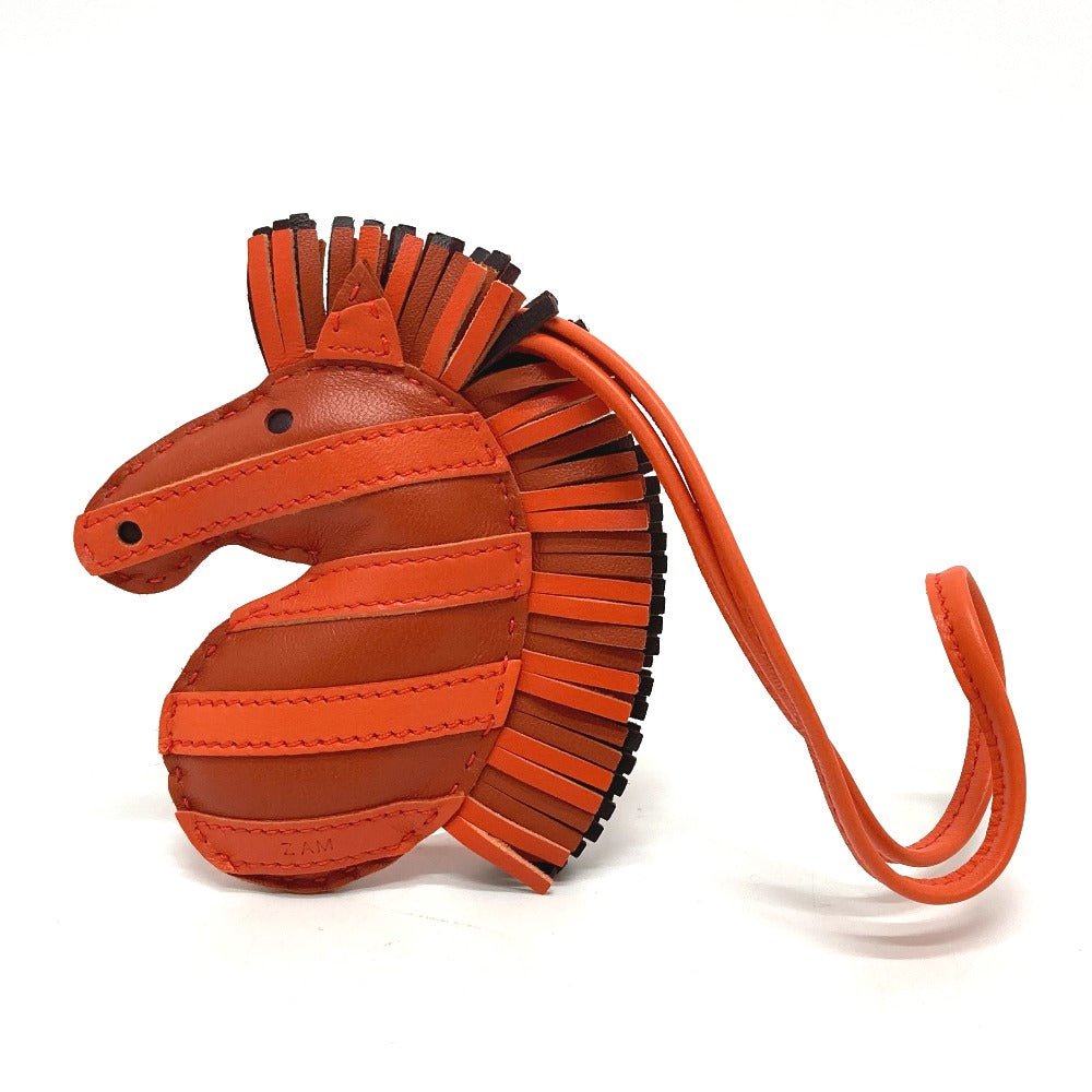 HERMES Bag charm lambskin Orange type zebra Gee Gee Savannah | AlmaBagz