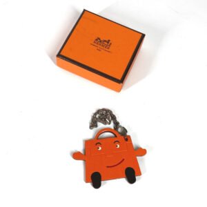HERMES key ring Leather, Votadelakt Orange 2011 Takashimaya Tokyo Japan Kelly doll | AlmaBagz