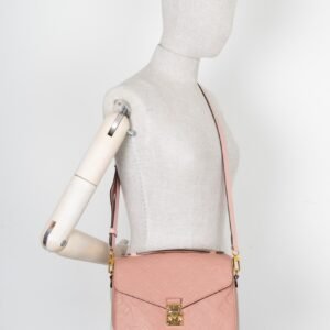 LOUIS VUITTON Pochette Métis Empreinte Pink | AlmaBagz