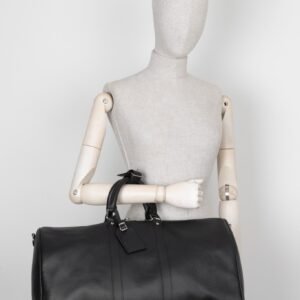 LOUIS VUITTON Keepall 50 Bandouliere Black Taiga Leather | AlmaBagz