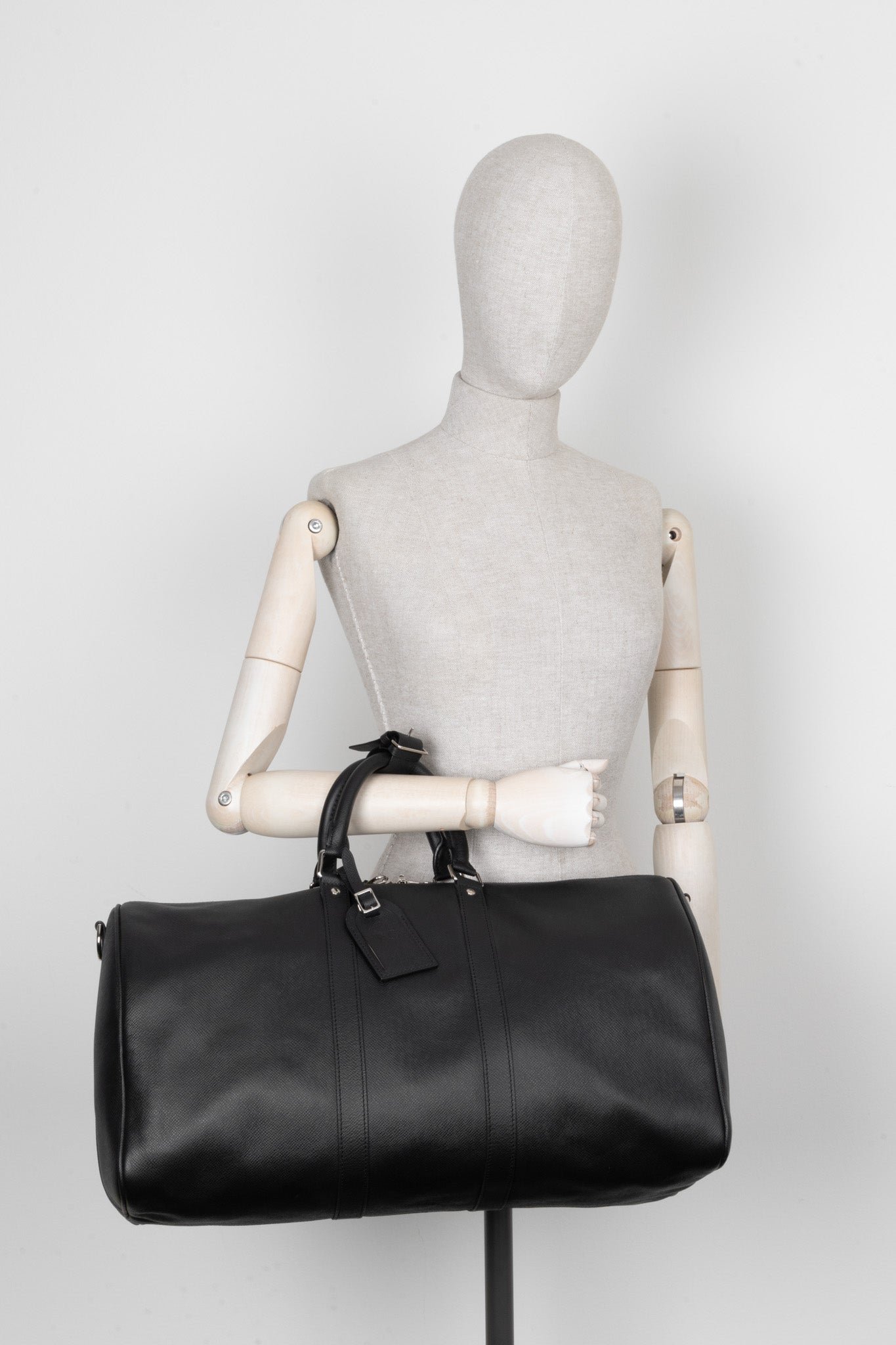 LOUIS VUITTON Keepall 50 Bandouliere Black Taiga Leather | AlmaBagz