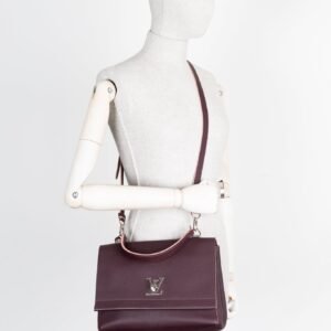 LOUIS VUITTON Lock Me II Handbag MM Prune | AlmaBagz