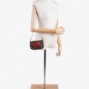 Louis Vuitton Pochette Accessoires Damier Ebene / Red Coated Canvas Mini | AlmaBagz