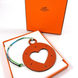 HERMES charm Taurillon Clemence , Epsom Orange Circle in Heart Petit h petit ash | AlmaBagz