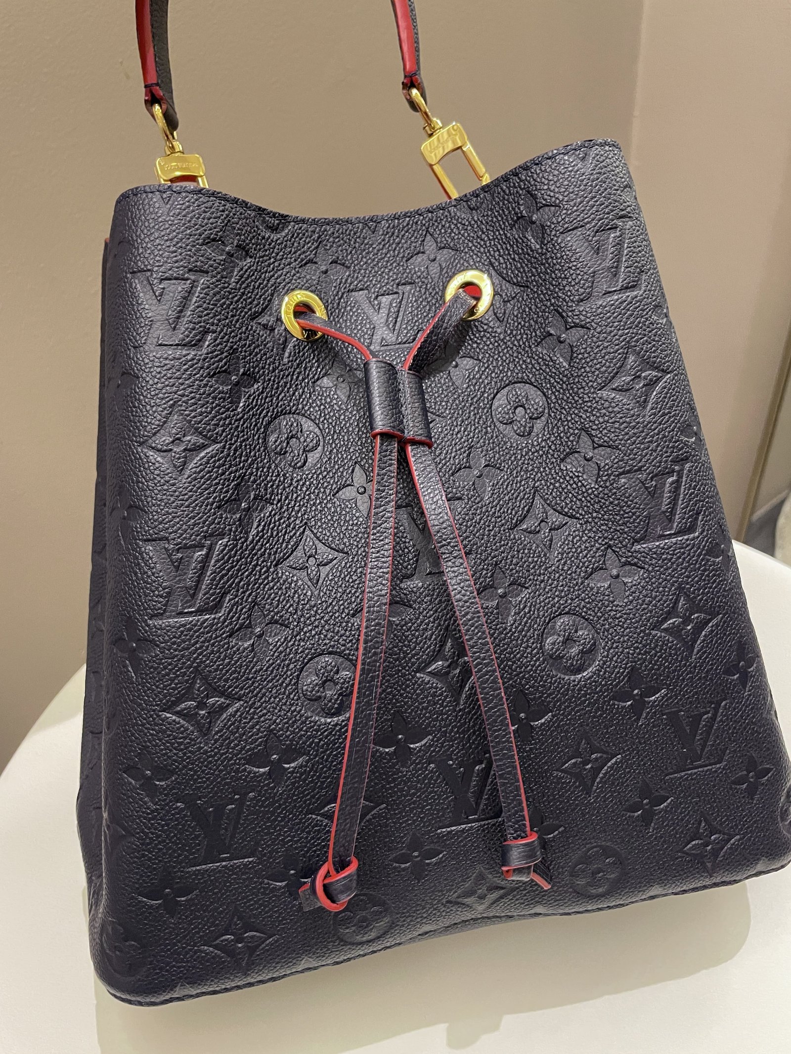 Louis Vuitton Neo Noe Bucket Bag Marine Rouge Empreinte Leather | AlmaBagz