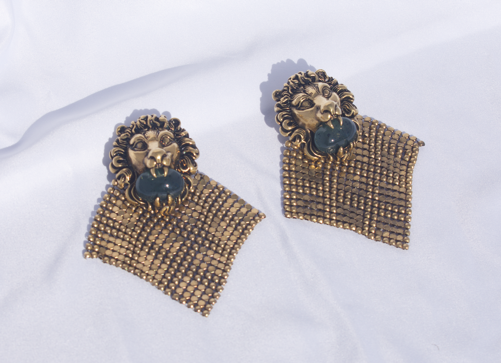 Gucci Lion Head Clip-on Earrings in Antique Gold | AlmaBagz