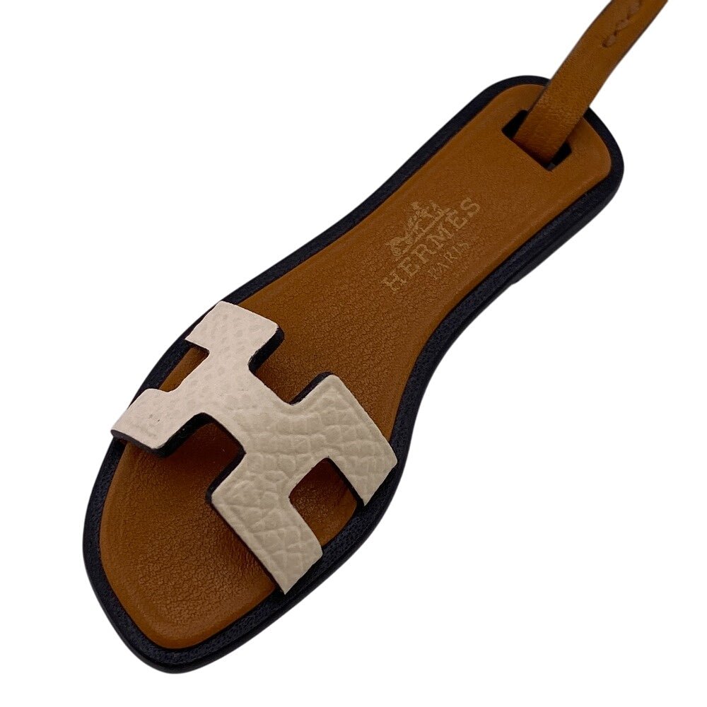 HERMES charm 080148CA leather Brown Oran Nano | AlmaBagz