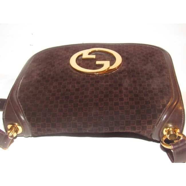 Gucci Blondie, brown square G logo print suede and brown leather, saddle bag style, shoulder bag with large, gold 'GG' cut-out | AlmaBagz