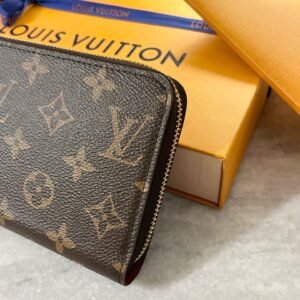 LOUIS VUITTON Monogram Zippy Wallet in Fuchsia | AlmaBagz