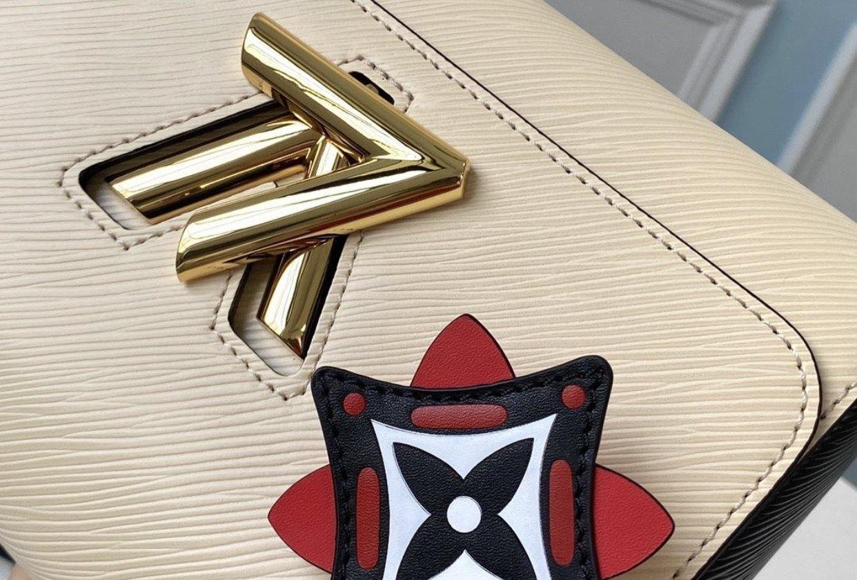 Louis Vuitton Crafty Twist MM Bag | AlmaBagz