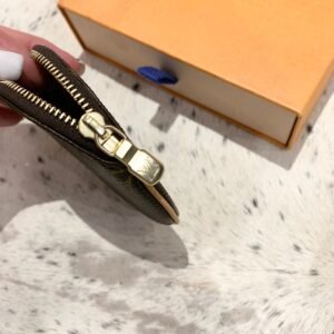 LOUIS VUITTON Monogram Round Coin Purse | AlmaBagz