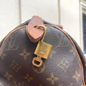 Louis Vuitton - Cadenas avec clé | AlmaBagz