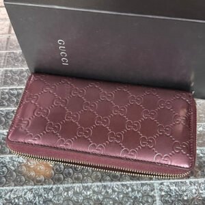 Gucci GG Embossed Burgundy Leather Wallet | AlmaBagz