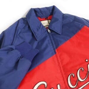 GUCCI Blouson Main: 100% nylon, Filling: 100% polyester, Part: 100% cotton, Part: 100% polyester Blue x red mens 44 Used | AlmaBagz