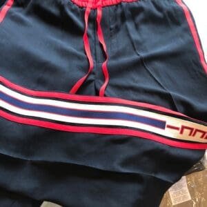 Gucci Side Logo Trim Jogger Pants in Black | AlmaBagz