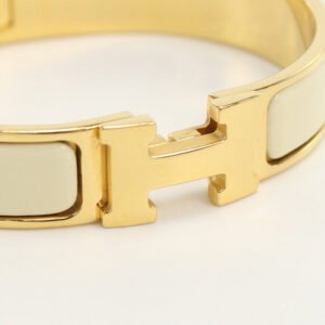HERMES Bangle Click H Bracelet Gold plated, enamel gold Women | AlmaBagz